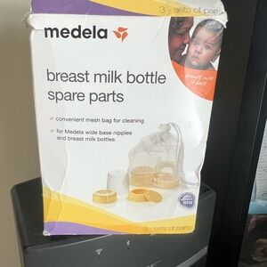 Medela Breast Milk Bottle Parts with Mesh Bag